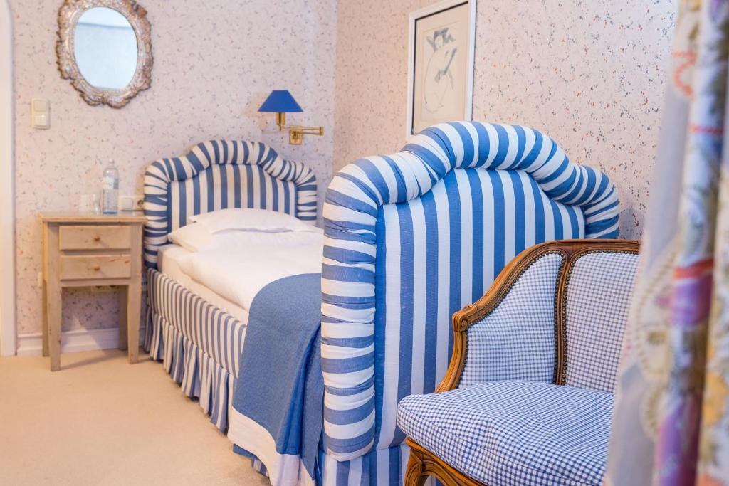 Postel nebo postele na pokoji v ubytování Hotel Edelweiss