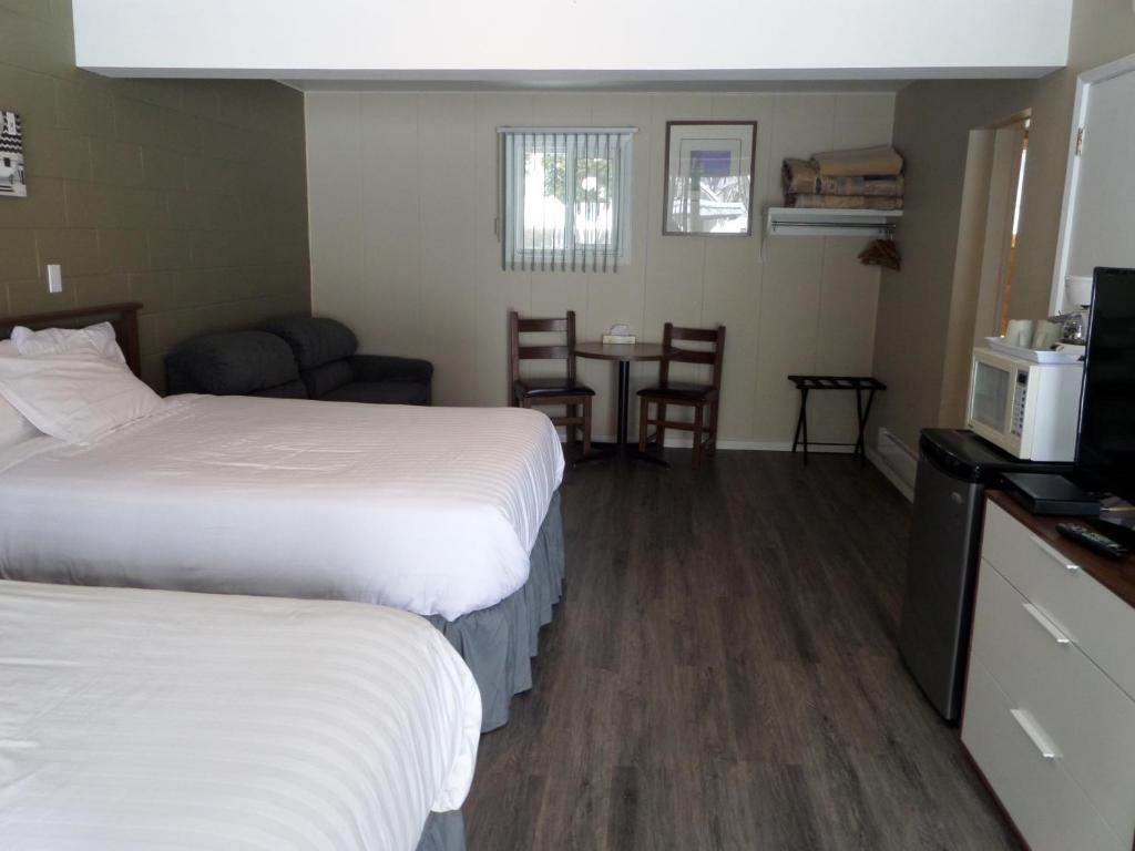 Postel nebo postele na pokoji v ubytování Ray Lyn Motel