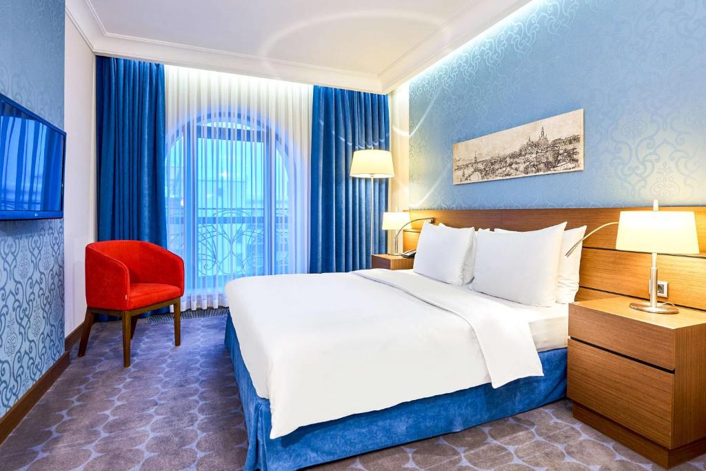 Postel nebo postele na pokoji v ubytování Radisson Blu Hotel, Kyiv Podil City Centre