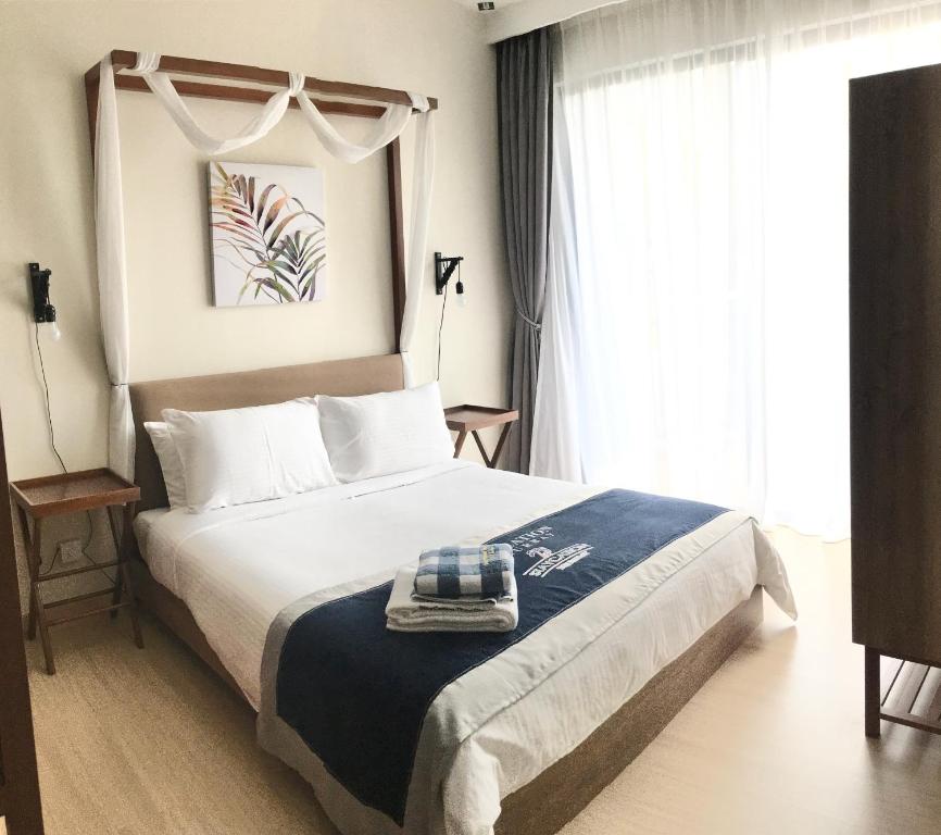 Кровать или кровати в номере kuantan staycationtimurbay