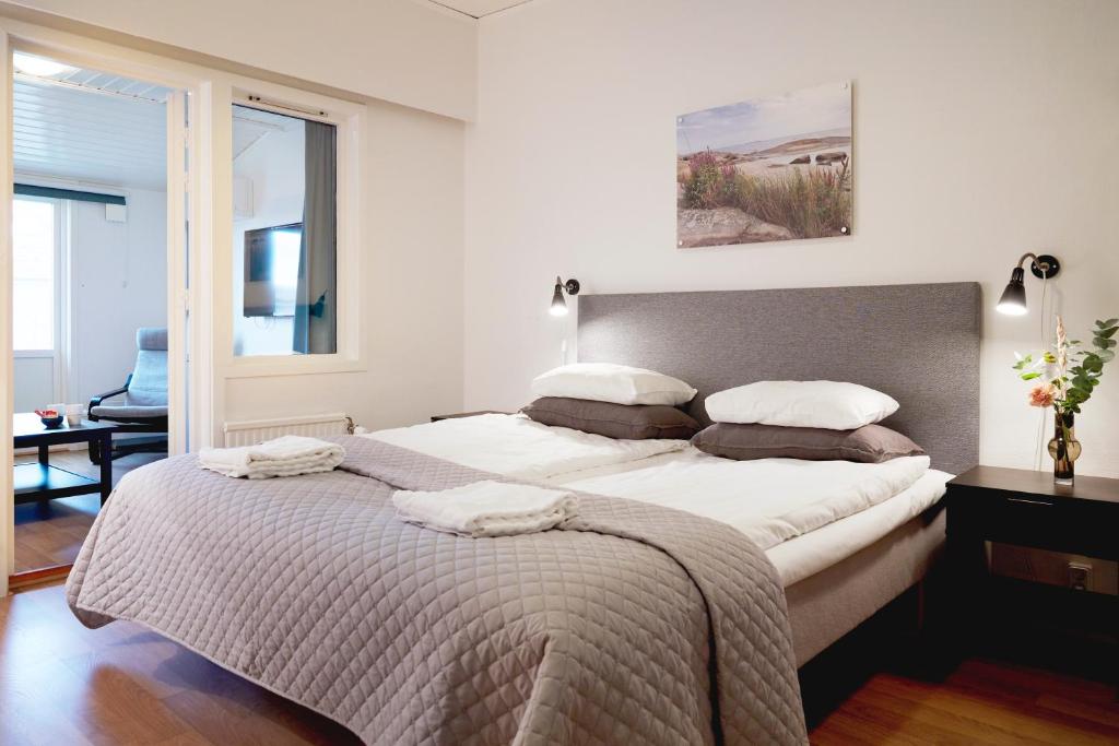 Postel nebo postele na pokoji v ubytování Hotell Vesterhavet