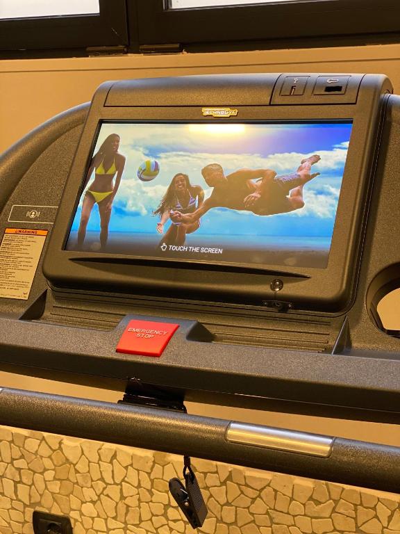 TV a/nebo společenská místnost v ubytování Art & Hotel Aeroporto