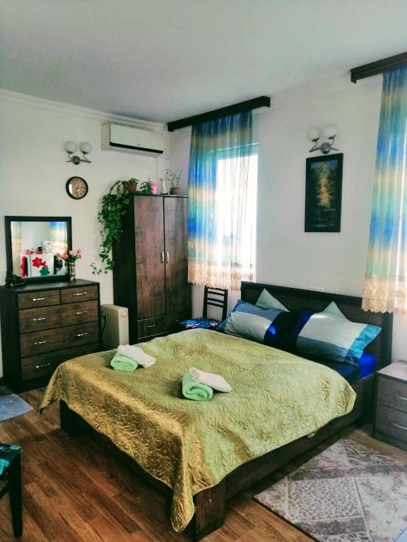 Postel nebo postele na pokoji v ubytování Guest House Marina