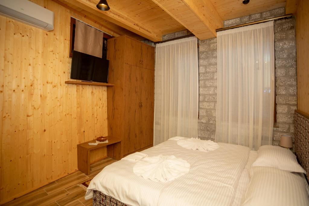Postel nebo postele na pokoji v ubytování OLD HOUSE