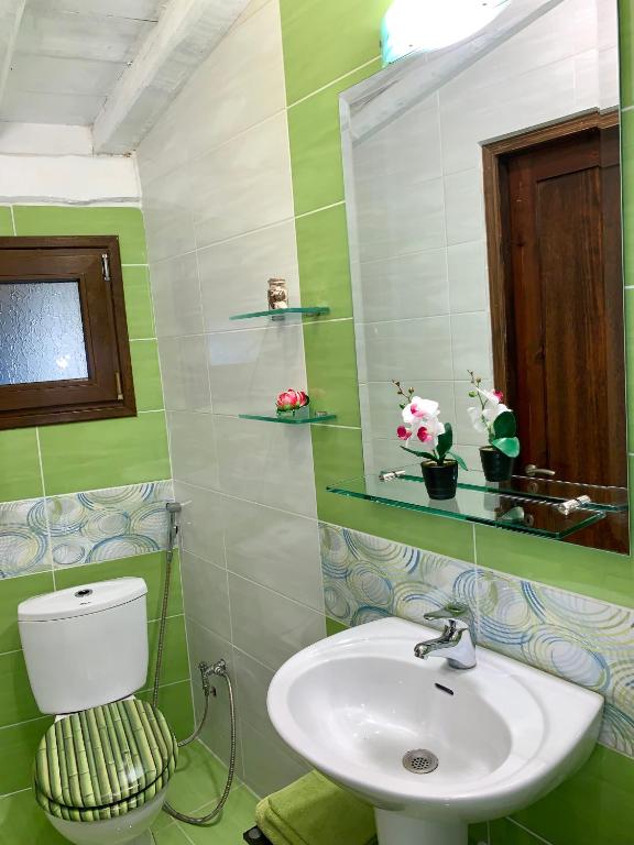 A bathroom at Ermones Emerald Villa
