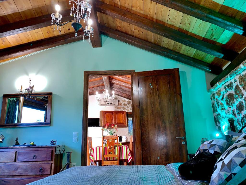 A bed or beds in a room at Ermones Emerald Villa