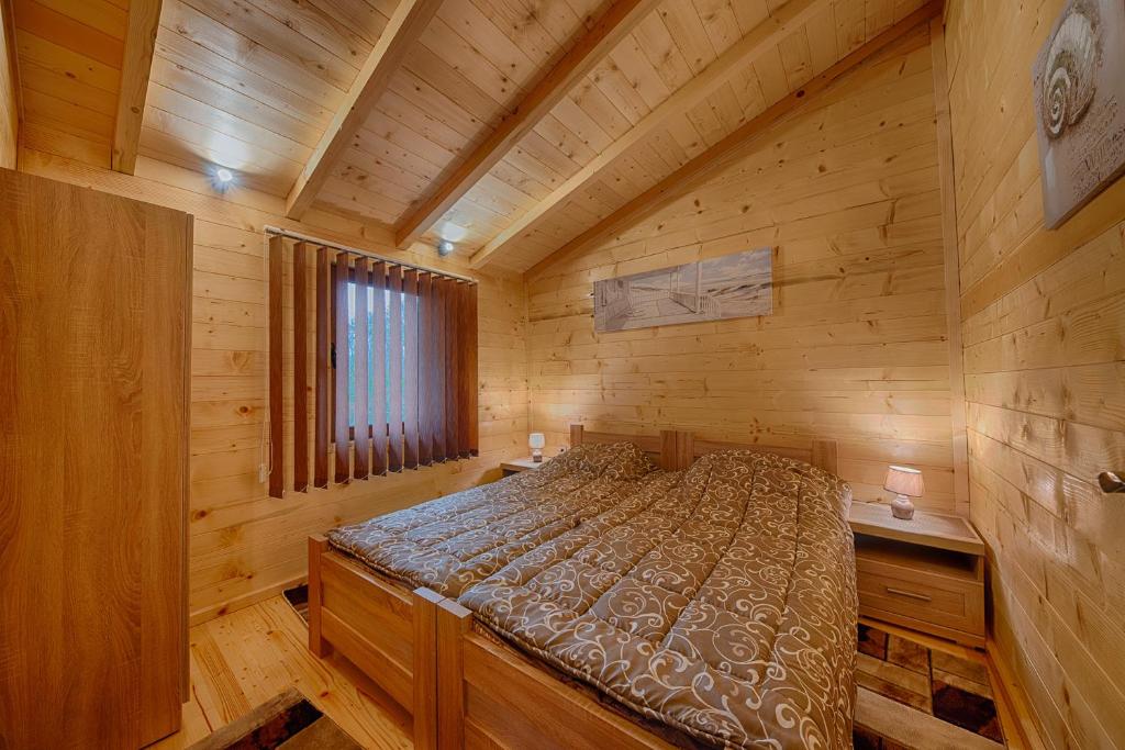 Postel nebo postele na pokoji v ubytování Rejan Lux