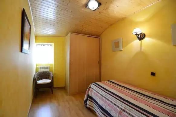 Postel nebo postele na pokoji v ubytování CASA TENA