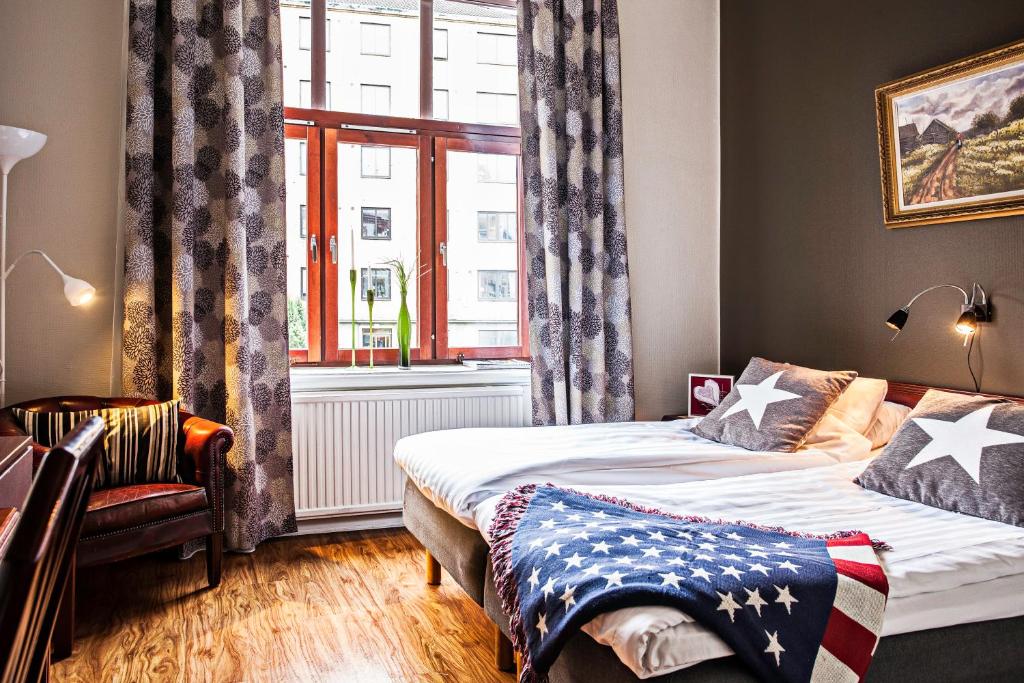 Postel nebo postele na pokoji v ubytování Best Western Tidbloms Hotel
