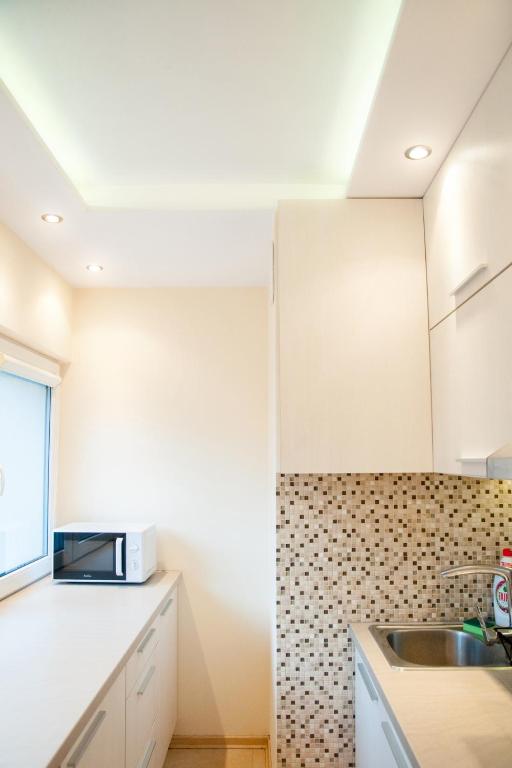 Kuchyňa alebo kuchynka v ubytovaní Apartament Turoszowska
