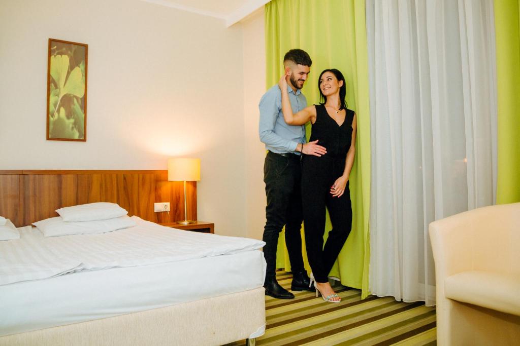Postel nebo postele na pokoji v ubytování Hotel Ginkgo