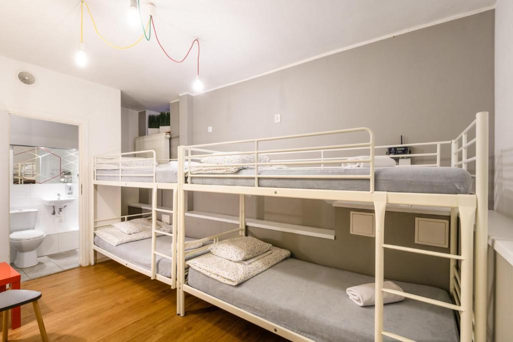 Posteľ alebo postele v izbe v ubytovaní Tatamka Hostel