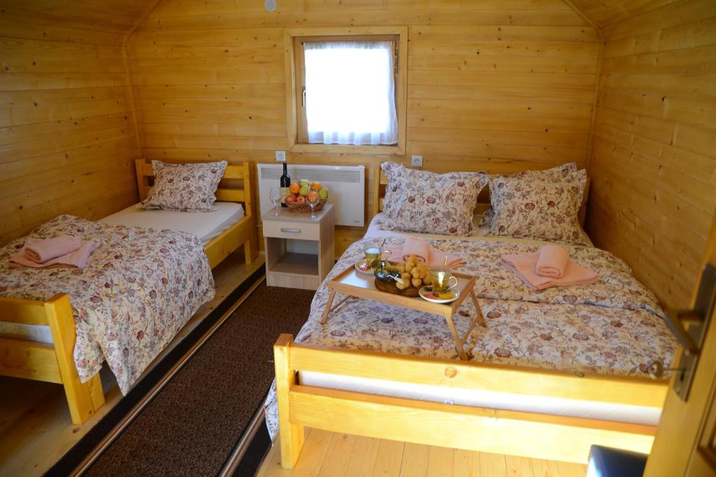 Postel nebo postele na pokoji v ubytování Resort Skrivena