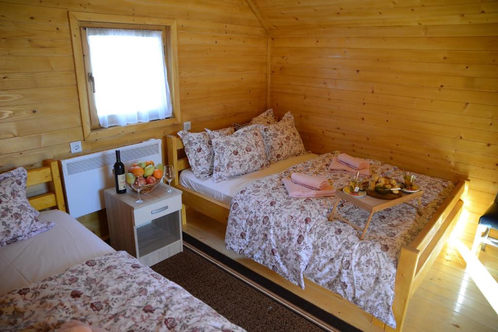 Postel nebo postele na pokoji v ubytování Resort Skrivena