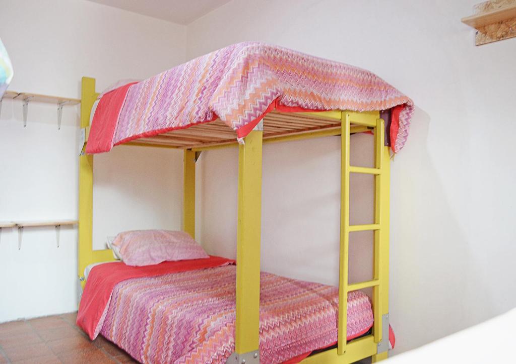 Postel nebo postele na pokoji v ubytování AlterNative Hostels