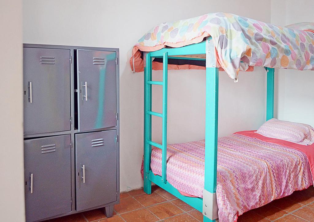 Postel nebo postele na pokoji v ubytování AlterNative Hostels
