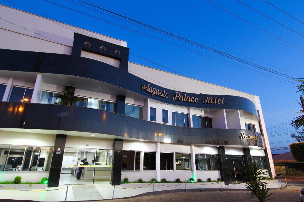 a large building with a sign that reads savannah palace hotel at Augusto Palace Hotel in Marabá