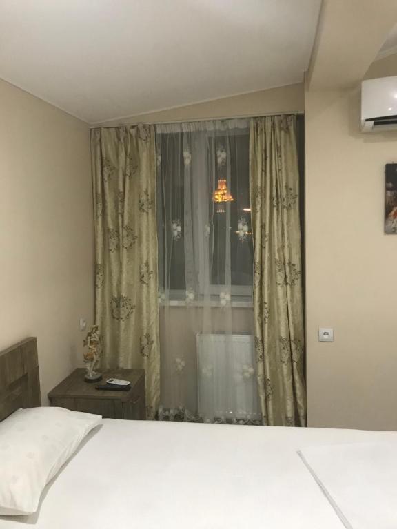 Postel nebo postele na pokoji v ubytování Appartment in heart of tbilisi