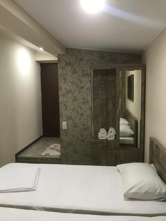 Postel nebo postele na pokoji v ubytování Appartment in heart of tbilisi