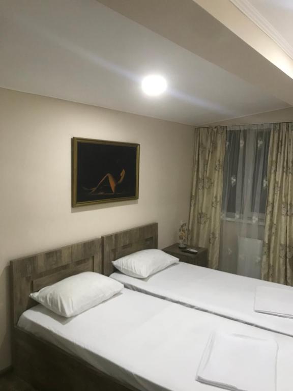 Postel nebo postele na pokoji v ubytování Appartment in heart of tbilisi