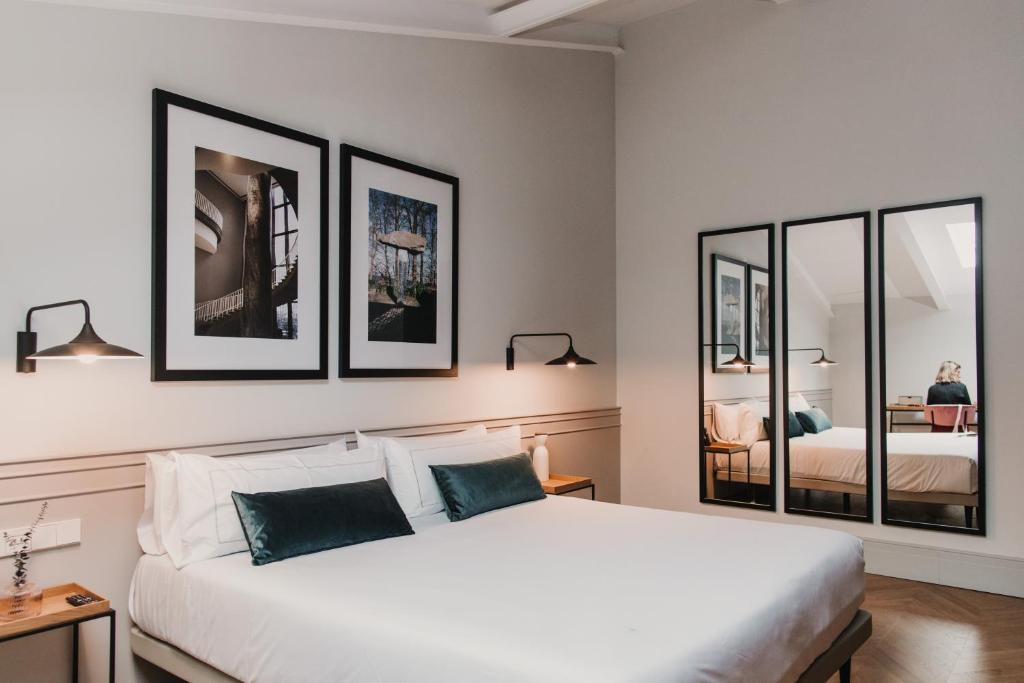 Cama o camas de una habitación en Helen Berger Boutique Hotel