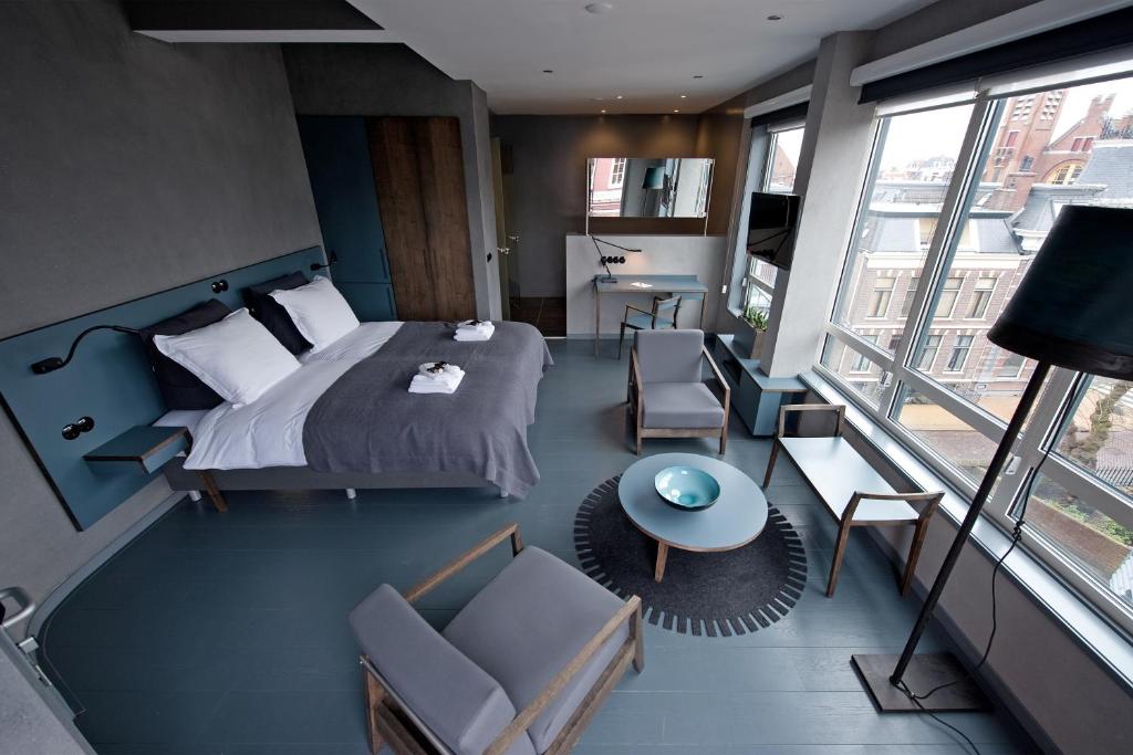 Postel nebo postele na pokoji v ubytování Asgard Hotel