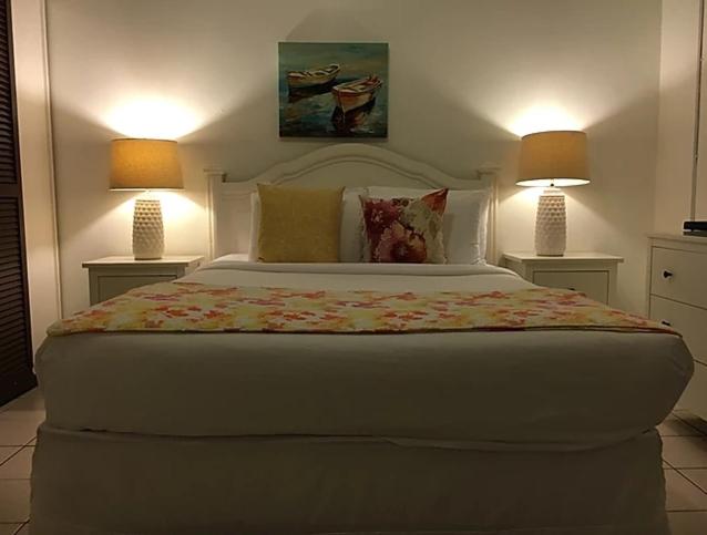 Postel nebo postele na pokoji v ubytování Hosteria del Mar