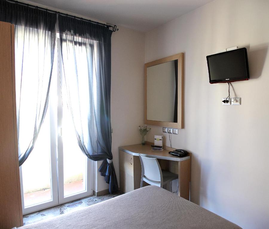 TV a/nebo společenská místnost v ubytování Hotel La Scaletta