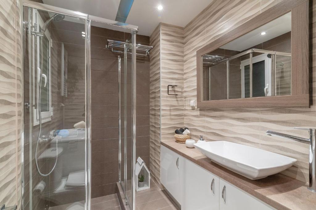 A bathroom at Kleio by Heloni Apartments