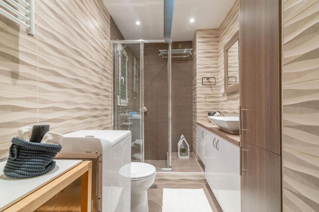 A bathroom at Kleio by Heloni Apartments