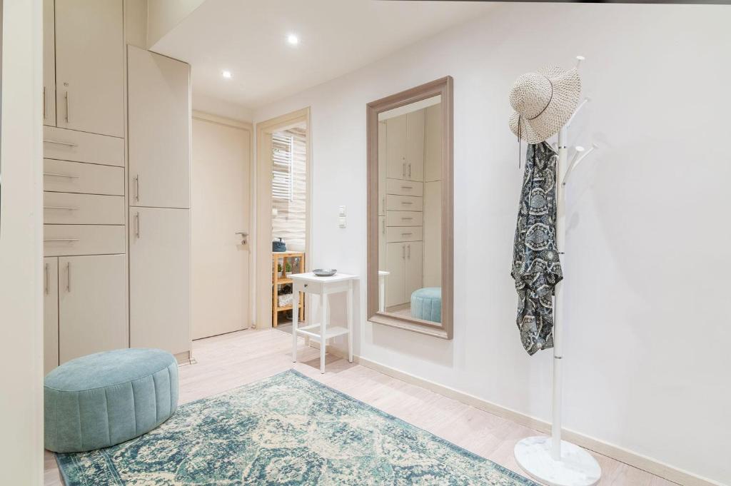 A bed or beds in a room at Kleio by Heloni Apartments