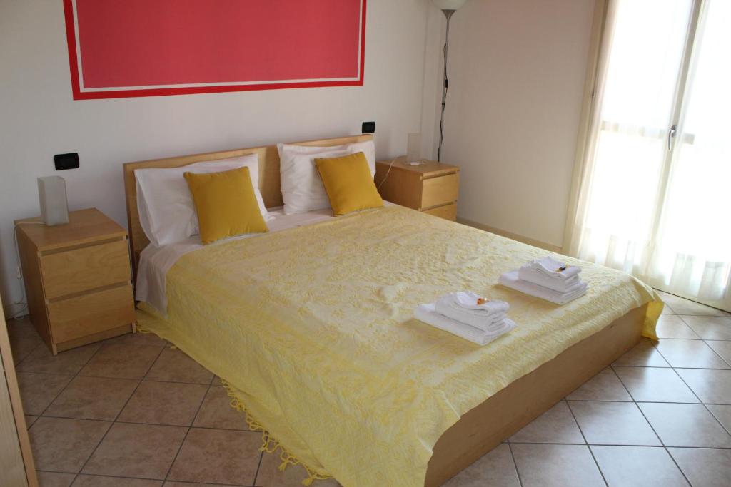 Łóżko lub łóżka w pokoju w obiekcie Villa Rosa