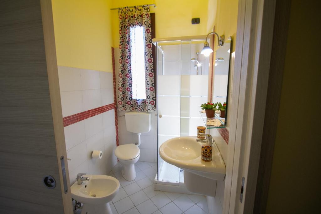 Koupelna v ubytování Hotel Merlino