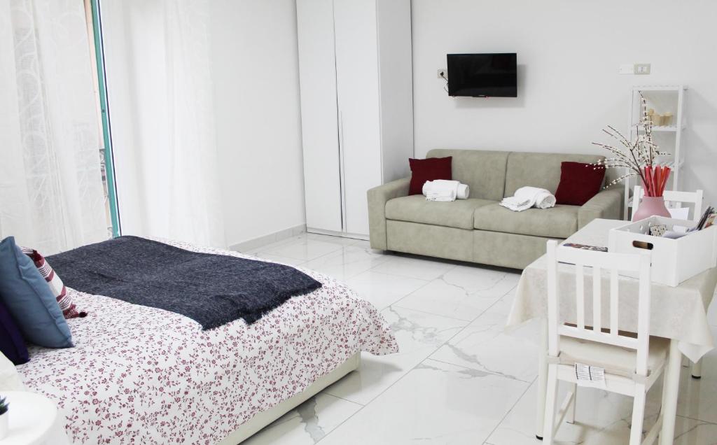 Posedenie v ubytovaní Conforti Apartment