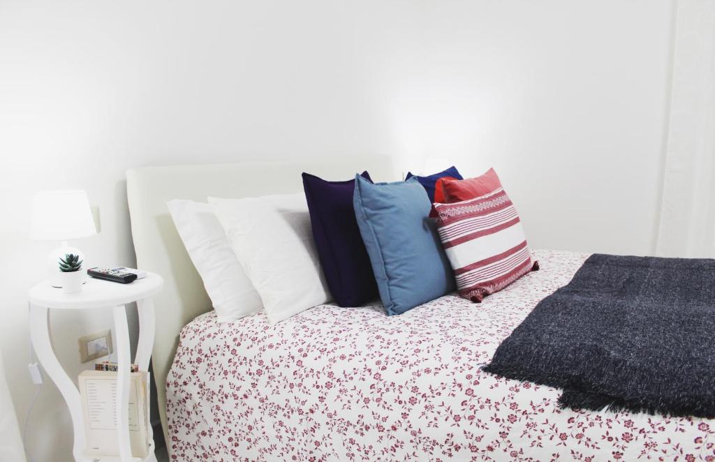Posteľ alebo postele v izbe v ubytovaní Conforti Apartment