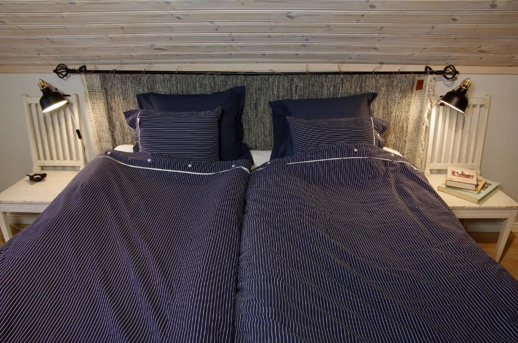 Postel nebo postele na pokoji v ubytování Hidingsta gård B&B