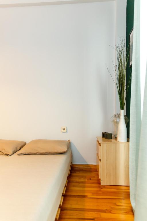 A bed or beds in a room at Velis apartment Thessaloniki