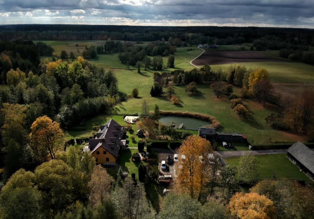 an aerial view of a house in a field at Dom Gościnny Woleninowo in Suwałki