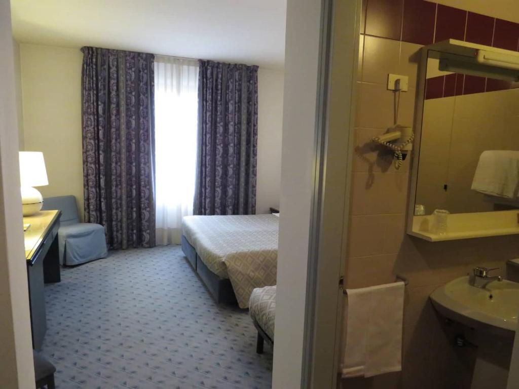 Koupelna v ubytování Hotel Turandot