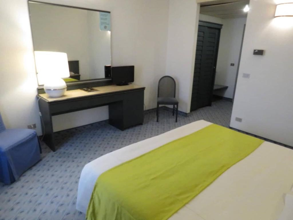 Postel nebo postele na pokoji v ubytování Hotel Turandot