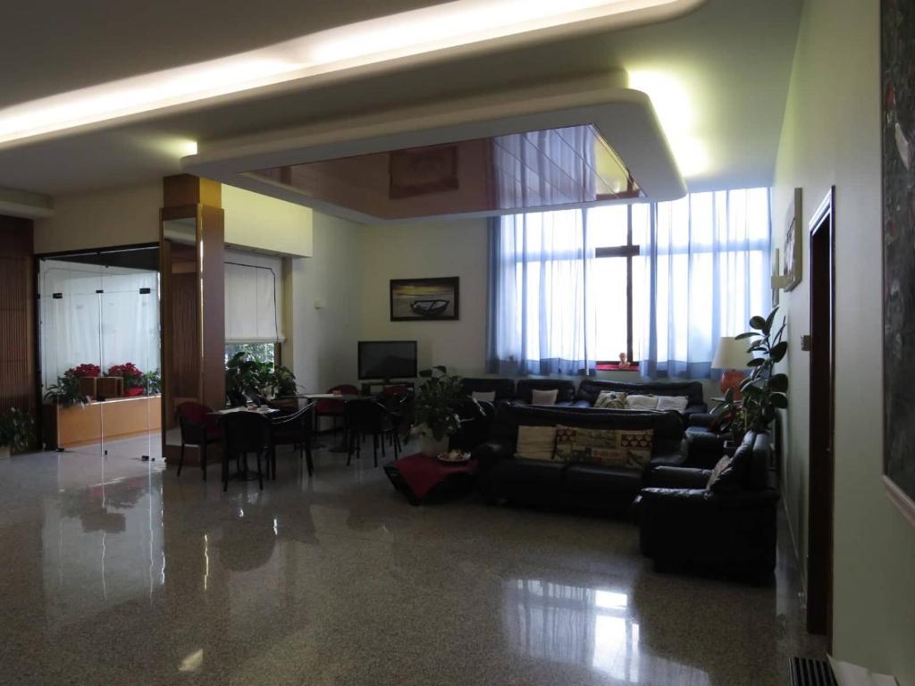 TV a/nebo společenská místnost v ubytování Hotel Turandot