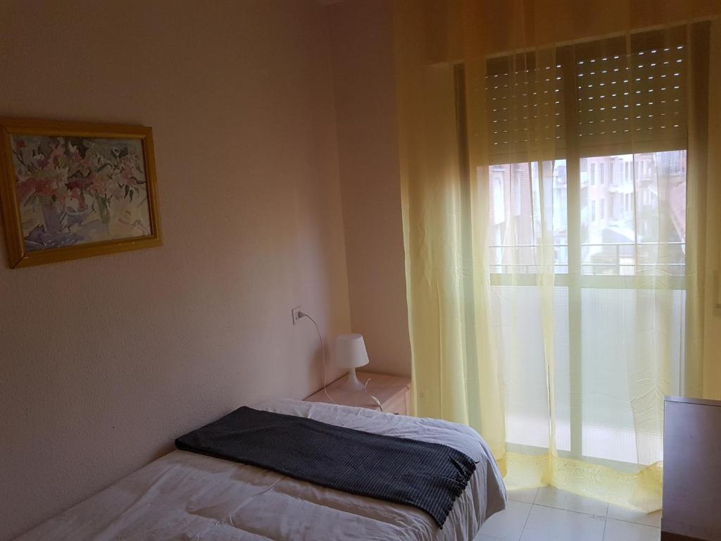 Postel nebo postele na pokoji v ubytování APARTAMENTO LOS BÚHOS