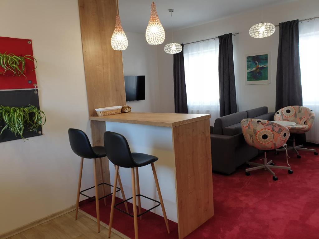 TV a/nebo společenská místnost v ubytování Penzion PIANO & Apartment Sokolov