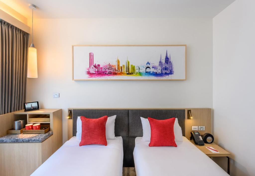 Postel nebo postele na pokoji v ubytování ibis Melbourne Central