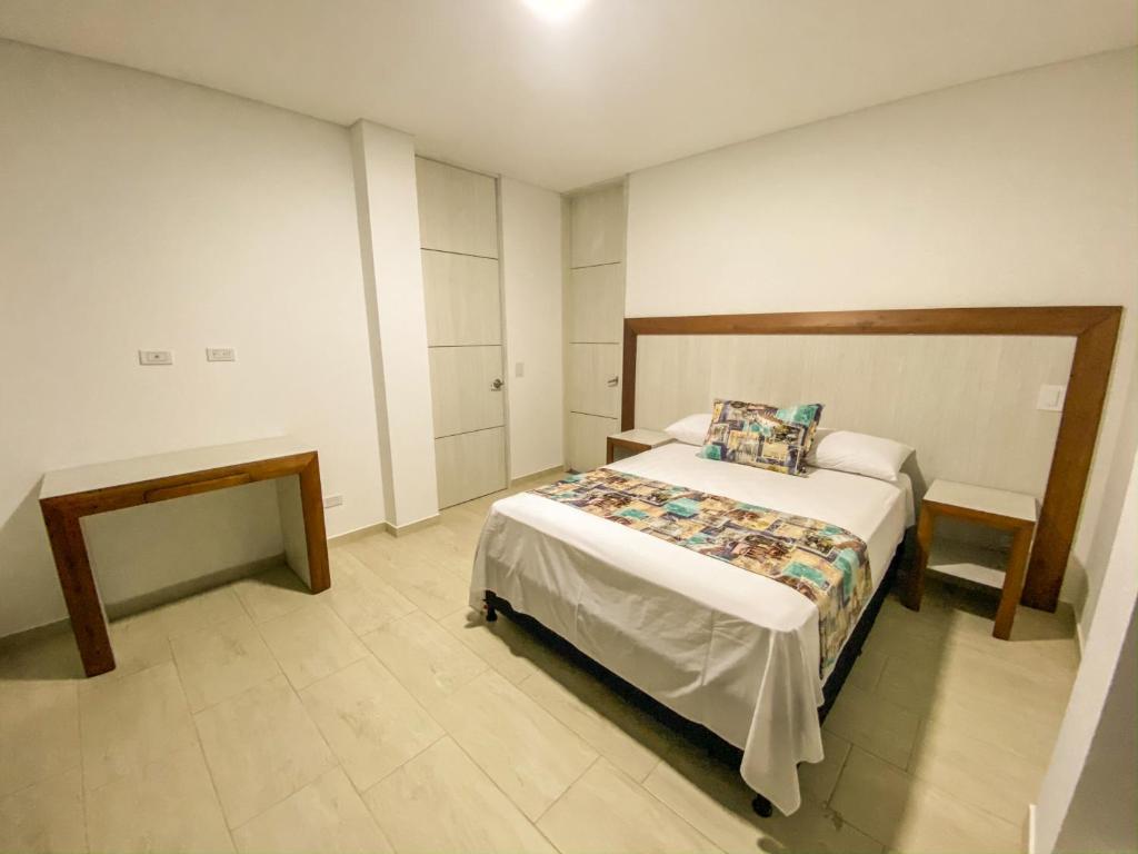 Postel nebo postele na pokoji v ubytování Hotel Santorini