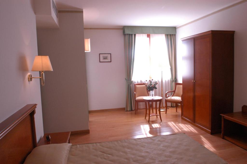 Postel nebo postele na pokoji v ubytování Pilgrim's Hotel