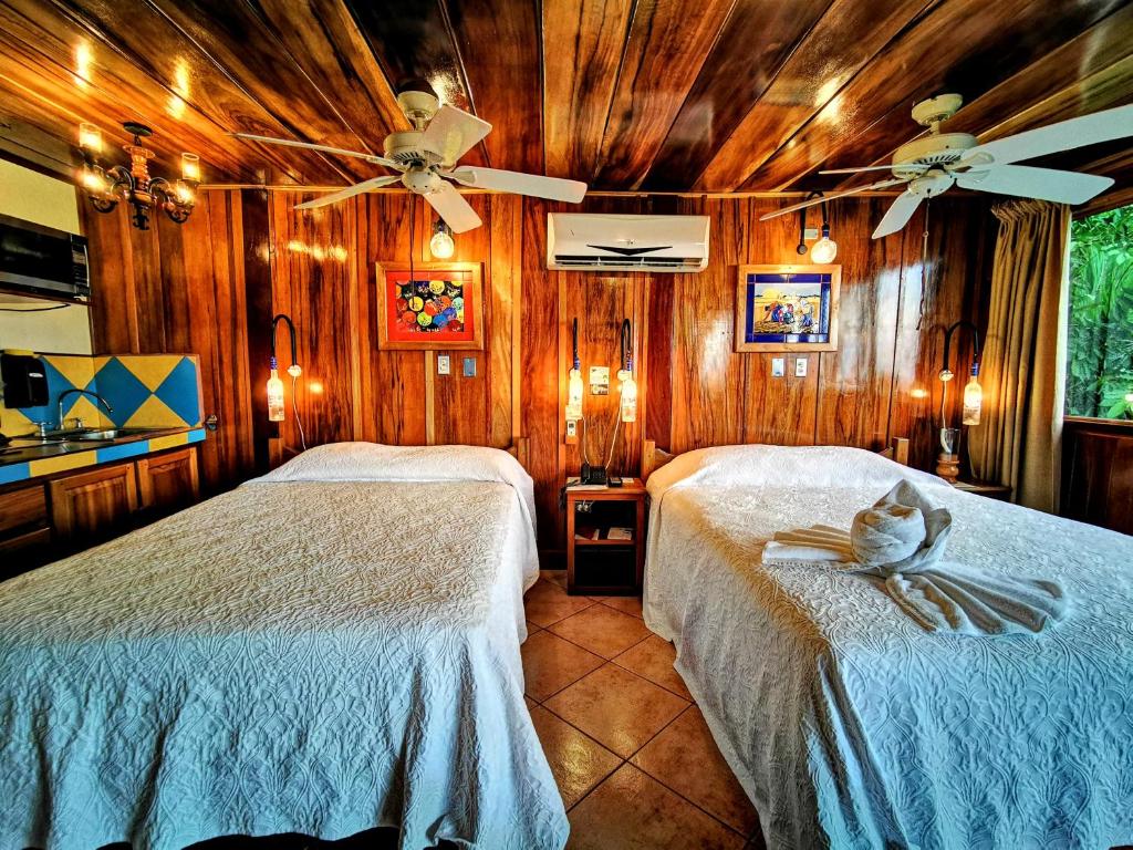 Postel nebo postele na pokoji v ubytování Hotel Costa Verde