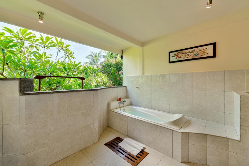 Koupelna v ubytování Kebun Indah Ubud