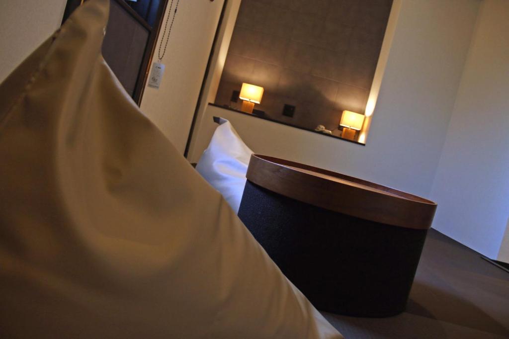 Postel nebo postele na pokoji v ubytování Hotel 3 O'Clock Tennoji