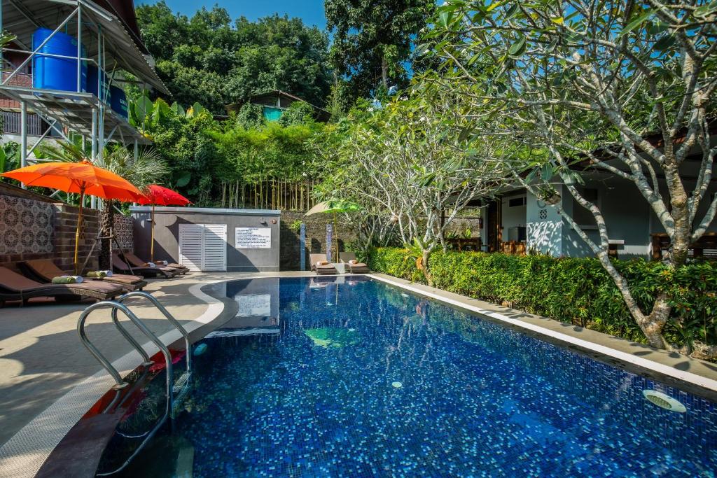 Der Swimmingpool an oder in der Nähe von Kata Tranquil Villa - SHA Plus